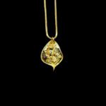 Melodious Krishna Flute Leaf Gold Pendant