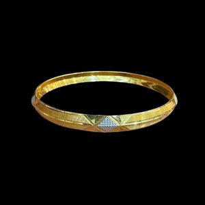 Radiant Star Diamond-Cut Gold Bangle
