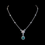 Elegant Carved Emerald & Diamond Drop Necklace